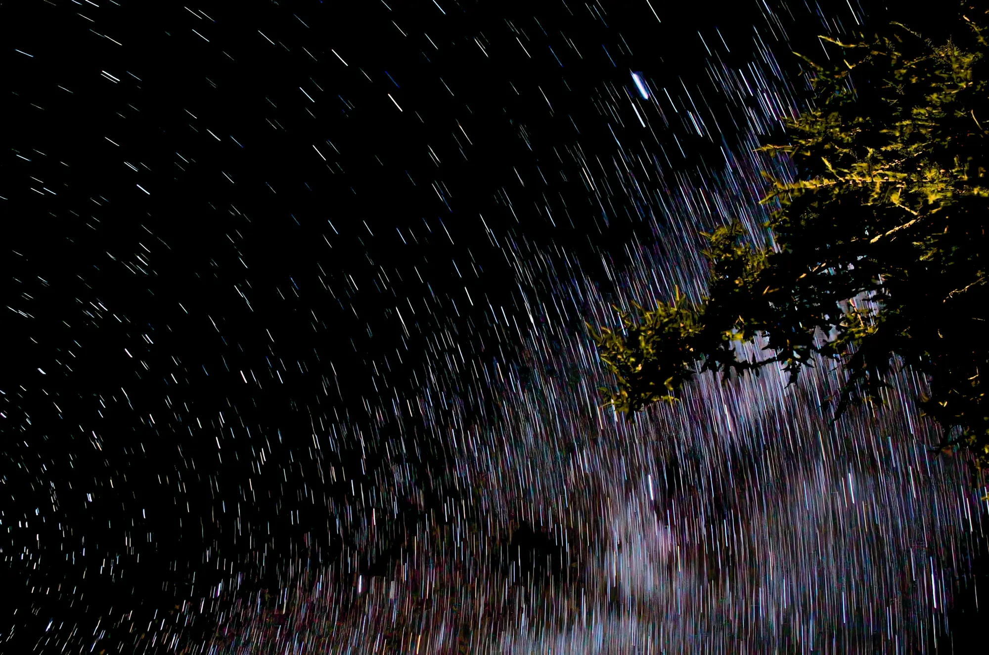 traînées d'étoiles et pluie